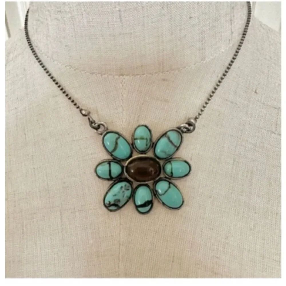 Sterling silver howlite and amber flower pendant necklace